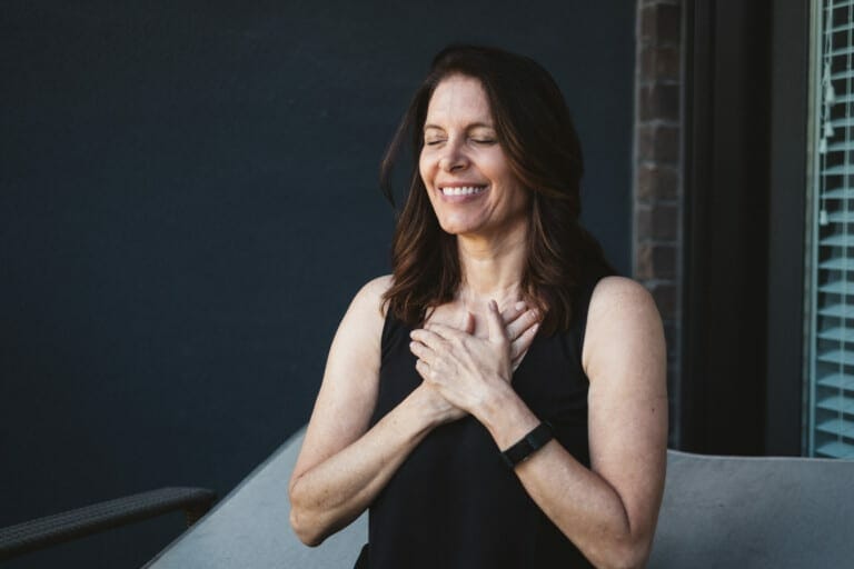 Mara with hands on her heart