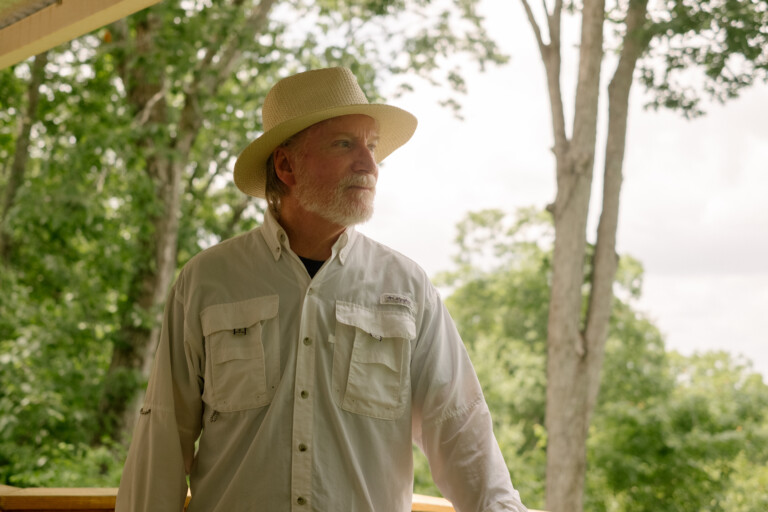 Mark outdoors in a wide-brimmed hat