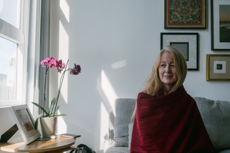 Colleen by a window
